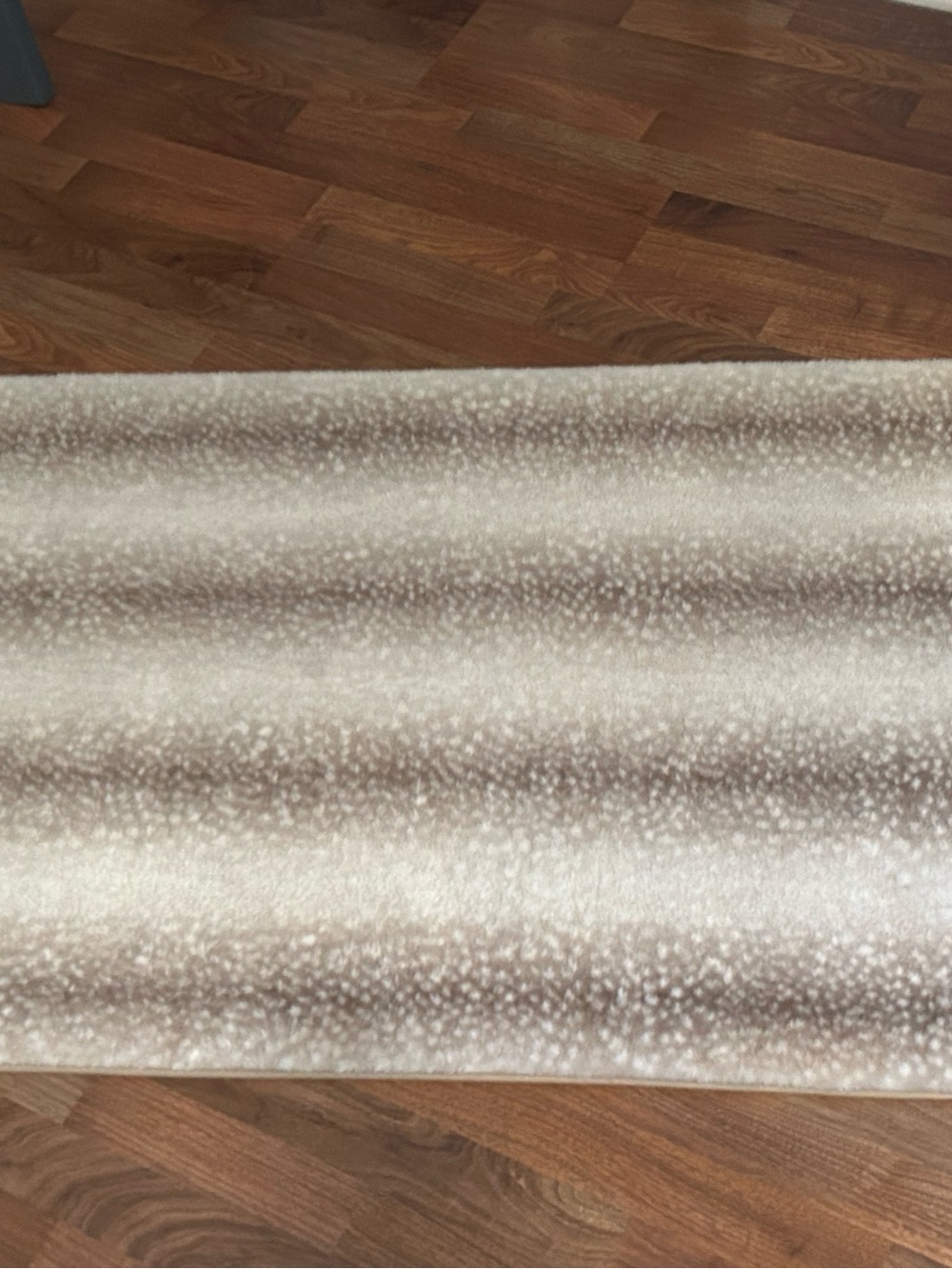 Dearfoams 36in x 56in neutral colors cream and beige antelope print rug